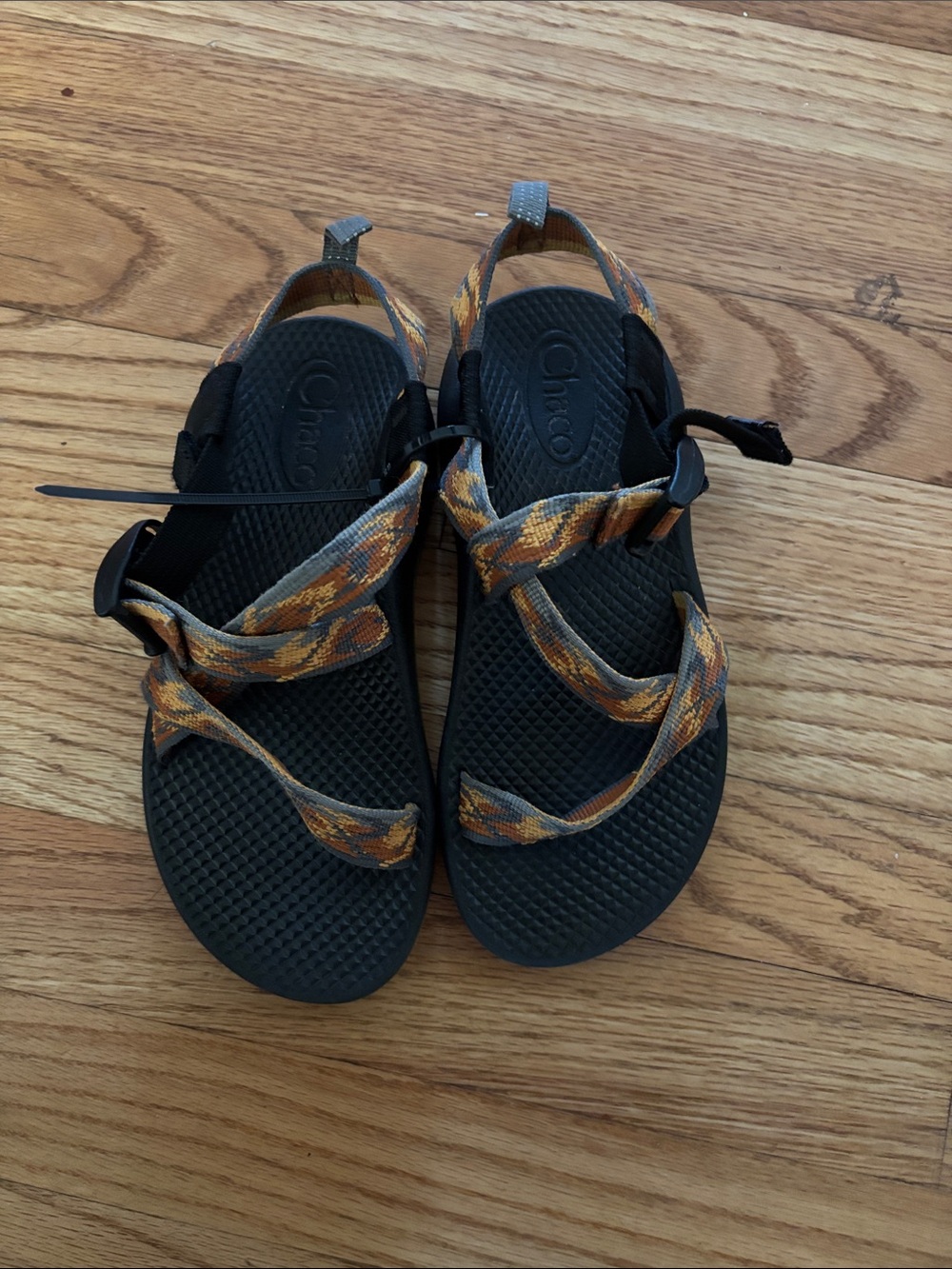 Chaco Black Sandals with Orange and Tan Patterned Straps